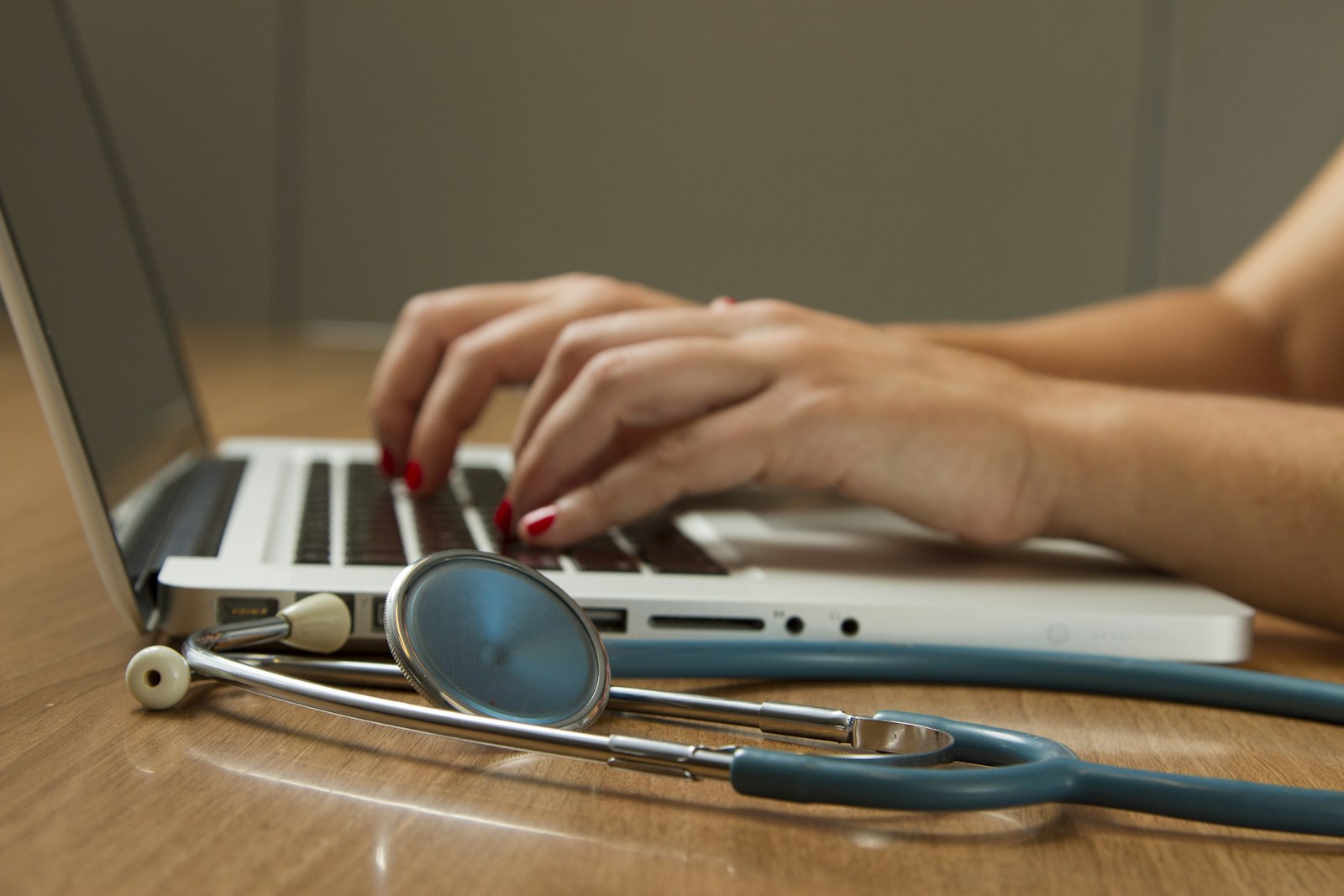 Healthcare planning tools beside a laptop